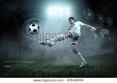 Soccer player with ball in action outdoors