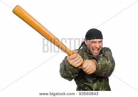 Young man in soldier uniform holding bludgeon isolated on white
