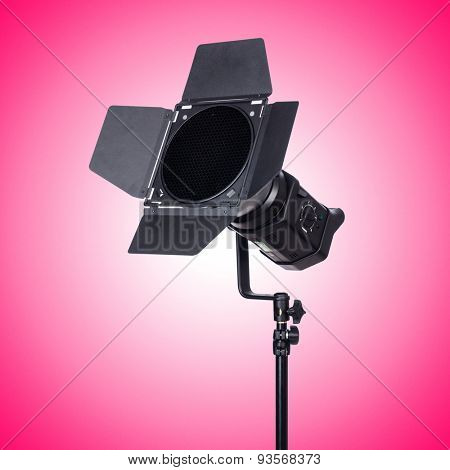 Studio light stand against the gradient