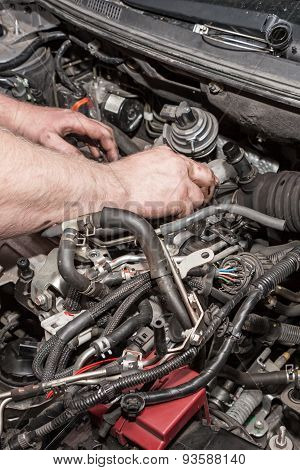 Mechanic working on engine