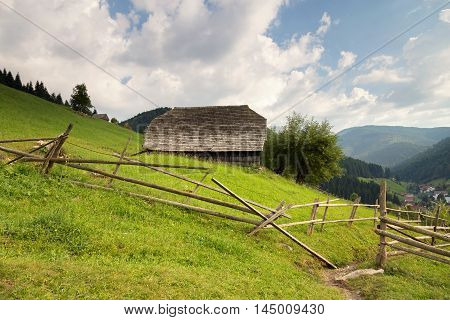 Summer landscape above the village in Moeciu de Sus - Bran, Romania