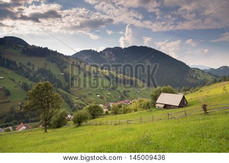 Summer landscape above the village in Moeciu de Sus - Bran, Romania