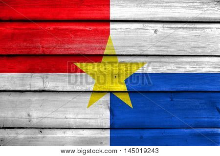 Flag Of Monteria, Colombia, Painted On Old Wood Plank Background