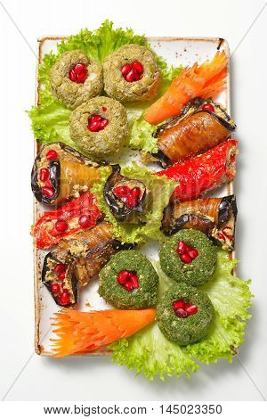 traditional Georgian cuisine - vegetable rolls and pates nut paste (pkhali)