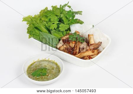 Roll noddle served with fried tofu and mixed vegetables on white background.
