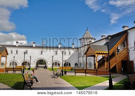 Tobolsk, Russia - July 15, 2016: Woman rests in interior of Guest Yard. Building of Gostiny dvor is built in 1703 - 1706 on project of architect, cartographer and historian of Siberia S. U. Remezov
