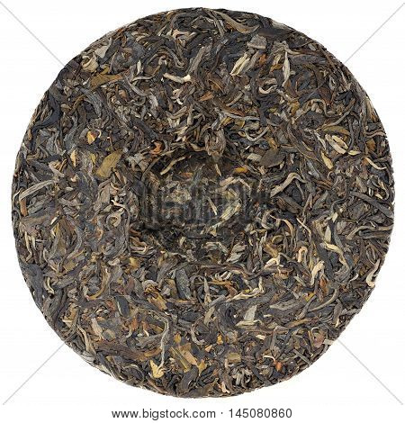 Myanmar raw puerh tea with stone impress overhead view isolated