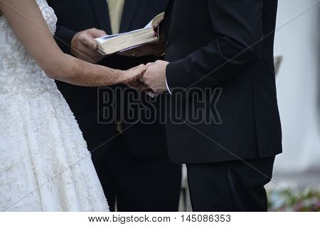 Happy Stylish Newlyweds In The Ortodox Church At Wedding