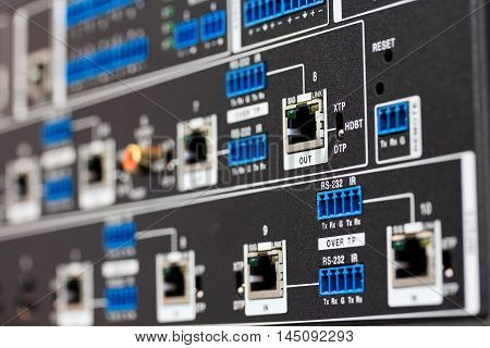 Close up of rear panel of HDBaseT equipment. Selective focus.