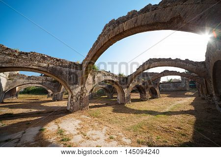 Ruin of The Venetian arsenal at Gouvia Corfu. The arches of the docks.