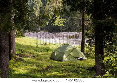 Camping tent in the wood during a hiking trip to Austria Nature