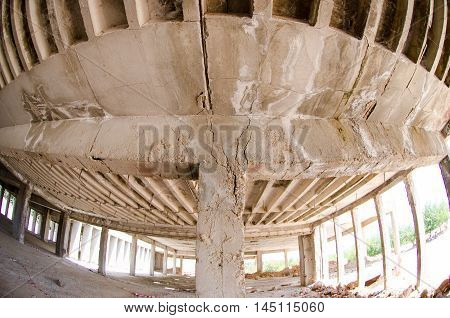 damage broken roof built, cracked columns, earthquake disaster