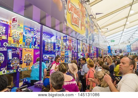 Melbourne, Australia - September 25, 2015: People queueing up to buy showbags in the Showbag Pavilion in the 2015 Royal Melbourne Show.