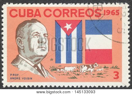 MOSCOW RUSSIA - CIRCA AUGUST 2016: a stamp printed in CUBA shows a portrait of Professor Andre Voisin the series 
