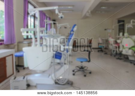 patient chair Dentistry In Clinic Dentist. Professional Dentist tools in the dental office. Dental Hygiene and Health . Blur blurred image.