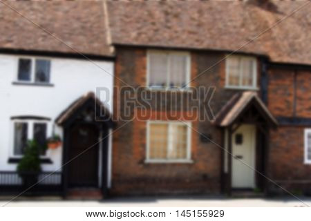 BEACONSFIELD ENGLAND - JUNE 2016: Old terrace houses in the old town Out of focus.