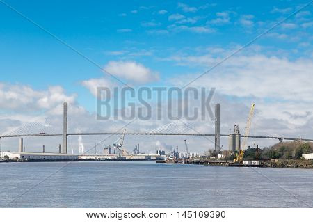 Industry beneath susnpension bridge on the Savannah River