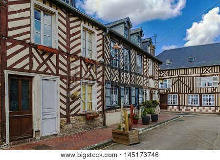 street with historical half-timbered houses in Beuvron-en-Auge France