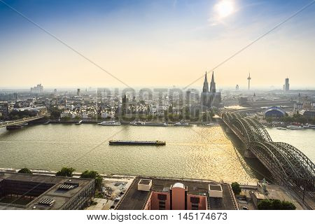 Koln Cityscape With Cathedral And Steel Bridge, Germany