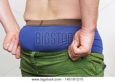 White Man Trying To Pull His Pants On A Fat Ass