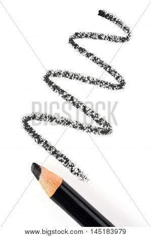 black kholliner traces and kajal over white background