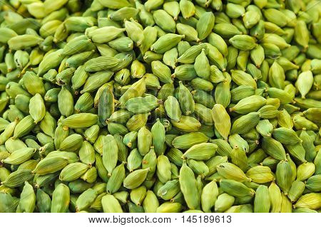 Pods of green cardamom in a pile