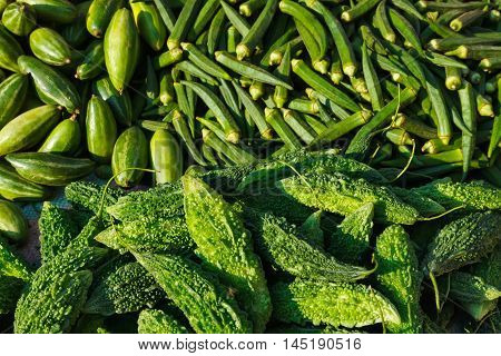 Many green vegetables ladyfingers and karela in Indian market