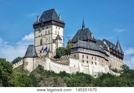 Karlstejn is a large gothic castle founded 1348 by Charles IV in Czech republic. Ancient architecture. Travel destination. Beautiful place.