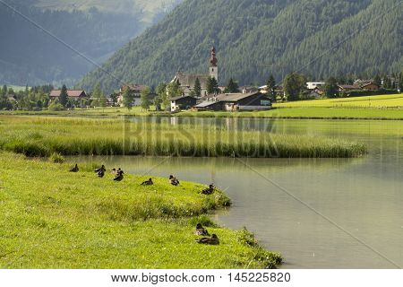Lake Pillersee With Parisch Church In Sankt Ulrich Am Pillersee