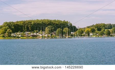 recreational area lake and forest bevertalsperre in the evening sun