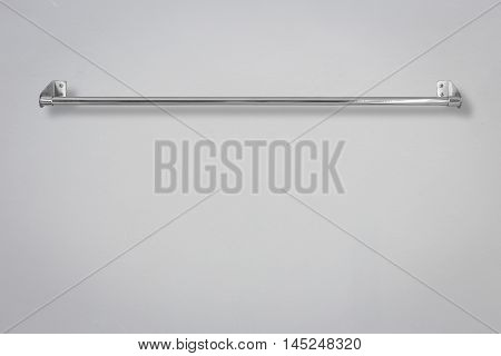 Stainless Steel Towel On Grey Cement Wall