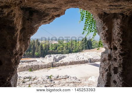 Section of the famous greek theater of Syracuse Sicily seen from one of the tomb in the upper terrace