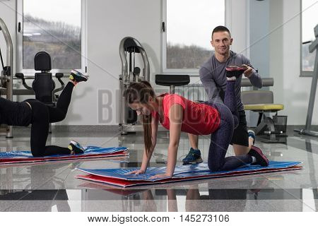 Young People Engaged In The Gym