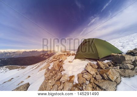 Camping on the top of the mountain in winter.