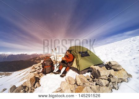 Camping on the top of the mountain in winter.