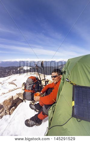Camping on the top of the mountain in winter.