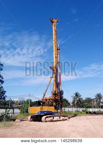 MALACCA, MALAYSIA -MARCH 12, 2015: Bore pile rig machine at the construction site in Malacca, Malaysia. The machine used to driven pile for building foundation work.