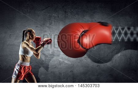 She is determined to fight . Mixed media