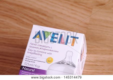 SARANSK, RUSSIA - AUGUST 31, 2016: Box of Philips AVENT baby bottle on wooden background.