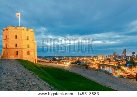 Scenic view from the top of Gediminas Hill to the center of Vilnius and Neris river at night.