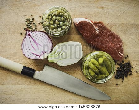 Mixing Steak Tartare Ingredients In A Bowl