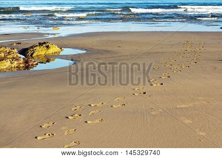 Footprints In The Sand On Polzeath Beach