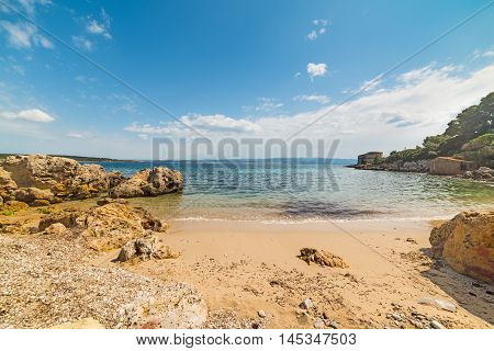 small cove with rocks and vegetation in Sardinia Italy