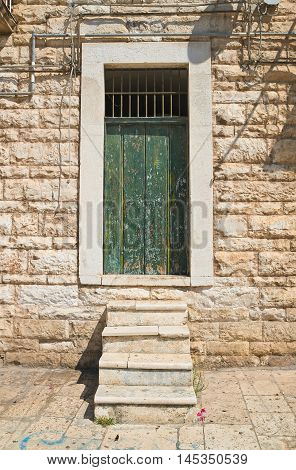 Detail of a wooden door. Molfetta. Puglia. Italy.