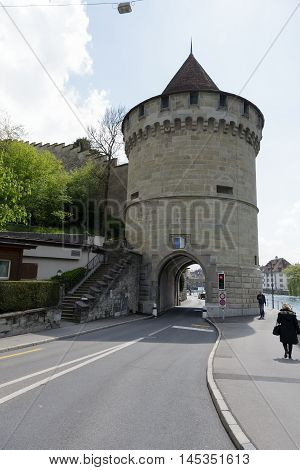 LUCERNE SWITZERLAND - MAY 04 2016: A round tower named Nolliturn is a part of Lucerne's ancient city walls.