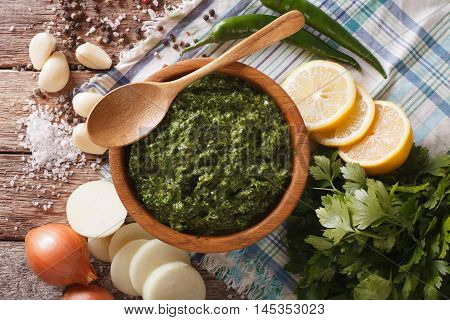 Argentine Chimichurri Sauce With Ingredients Close-up. Horizontal Top View