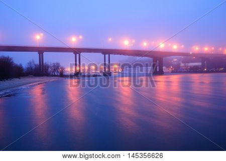 The Voroshilovsky bridge. Rostov-on-Don. Winter. A fog. Night