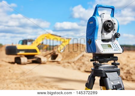 surveyor equipment theodolie at construction site