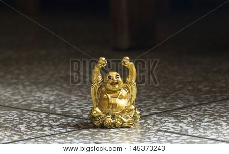 Sitting Buddha With Wealth Ball In Hand