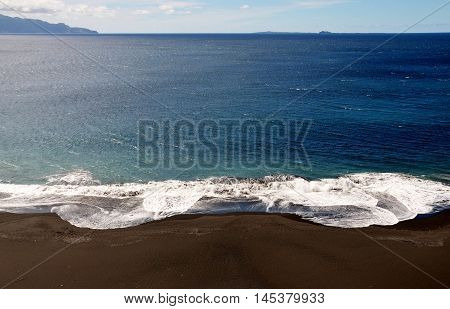 White Wave Squalls  Fill The Empty Black Beach